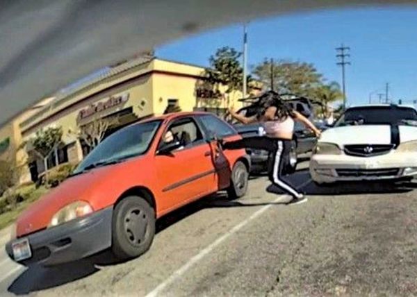 women kicking cars